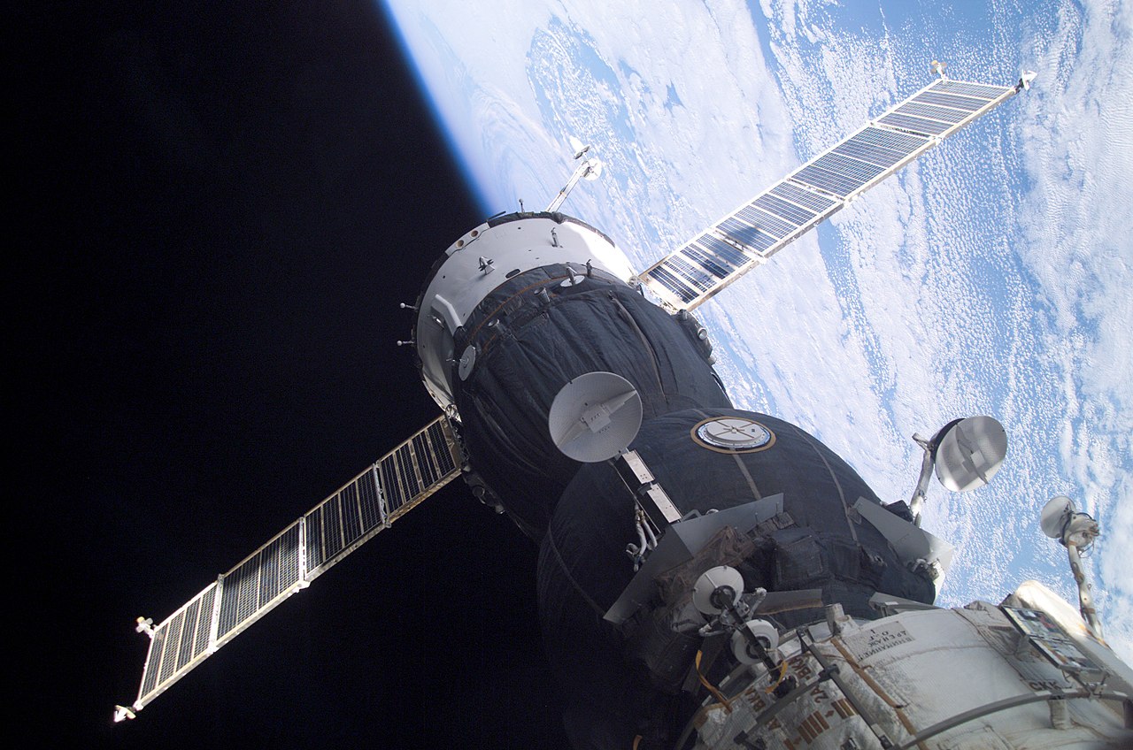 Time dilation explains why two working clocks will report different times after different accelerations. For example, at the ISS time goes slower, lagging 0.007 seconds behind for every six months. Time dilation explains why two working clocks will report different times after different accelerations. For example, at the ISS time goes slower, lagging 0.007 seconds behind for every six months.